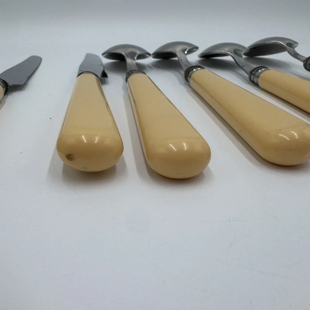 Jean Dubost Yellow Flatware 8 Pc Lot Stainless France Knives Spoons